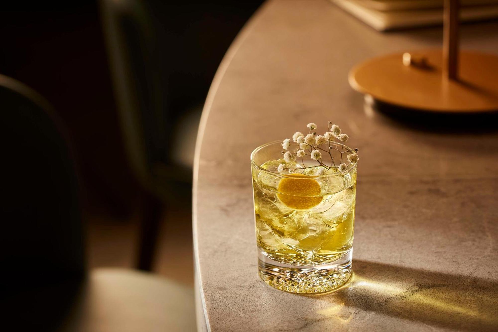 Nh Collection Helsinki Grand Hansa Exterior foto A glass of Old Fashioned